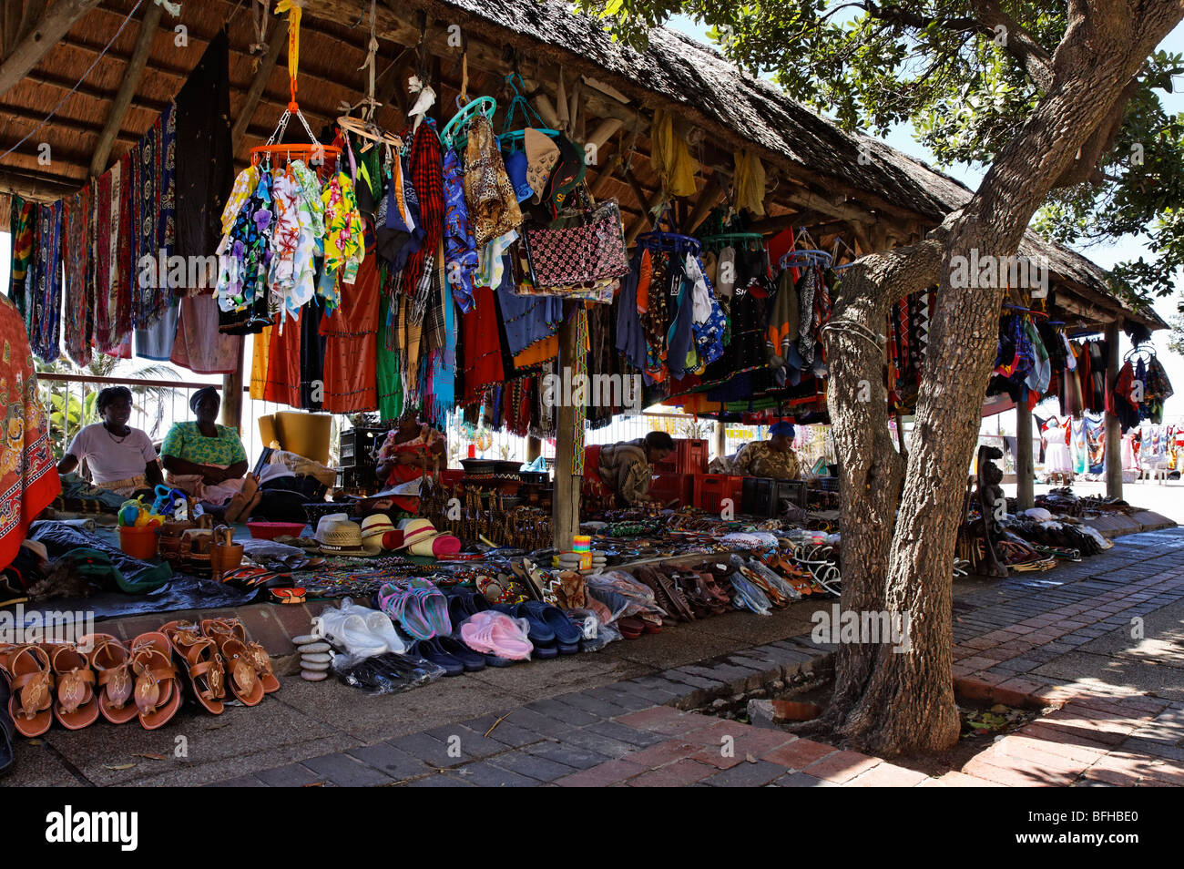 Colourful clothing and accessories on sale at tourist market in Durban