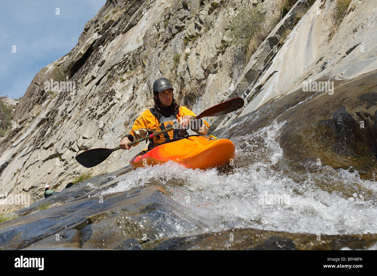 Man kayaking in mountain river Stock Photo