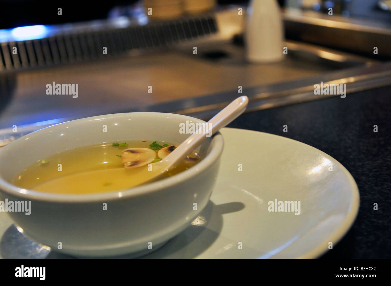 Bowl of soup with mushroom at Japanese Hibachi Grill restaurant Stock