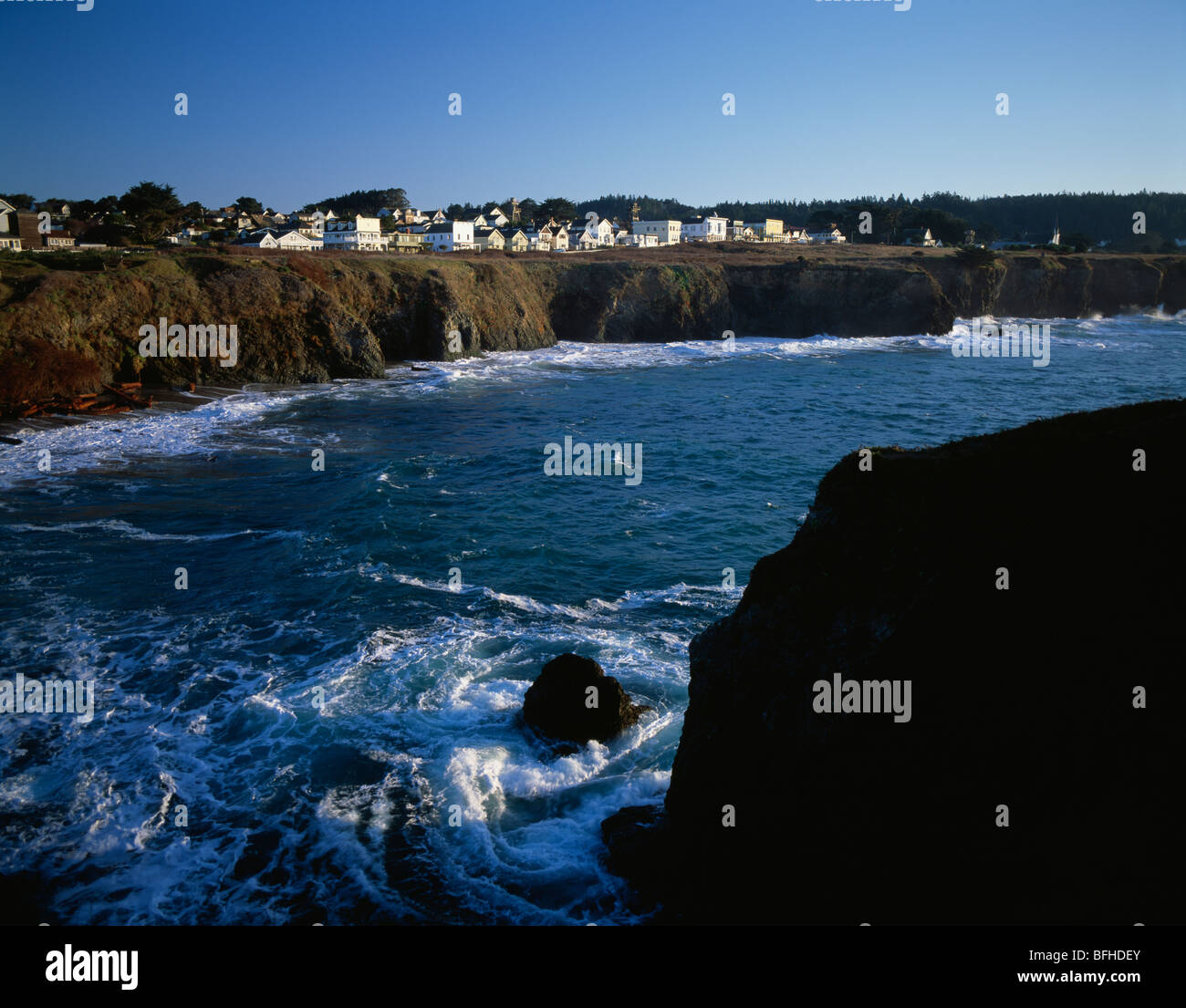 Downtown historic buildings along bluff with shops at sunrise along