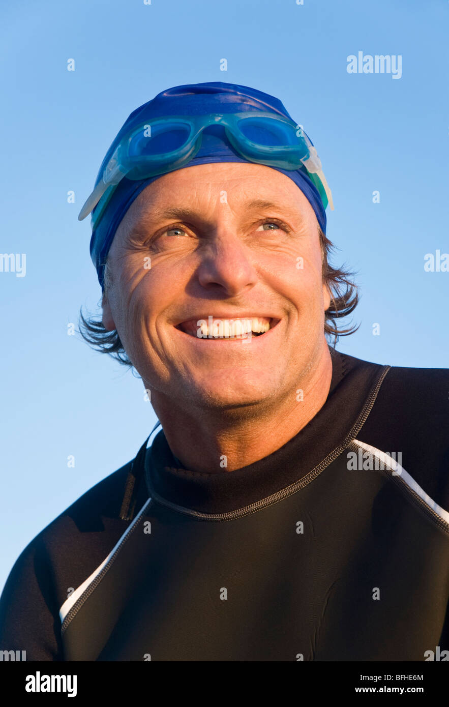 A colour portrait of a happy laughing swimmer or triathlete. Stock Photo