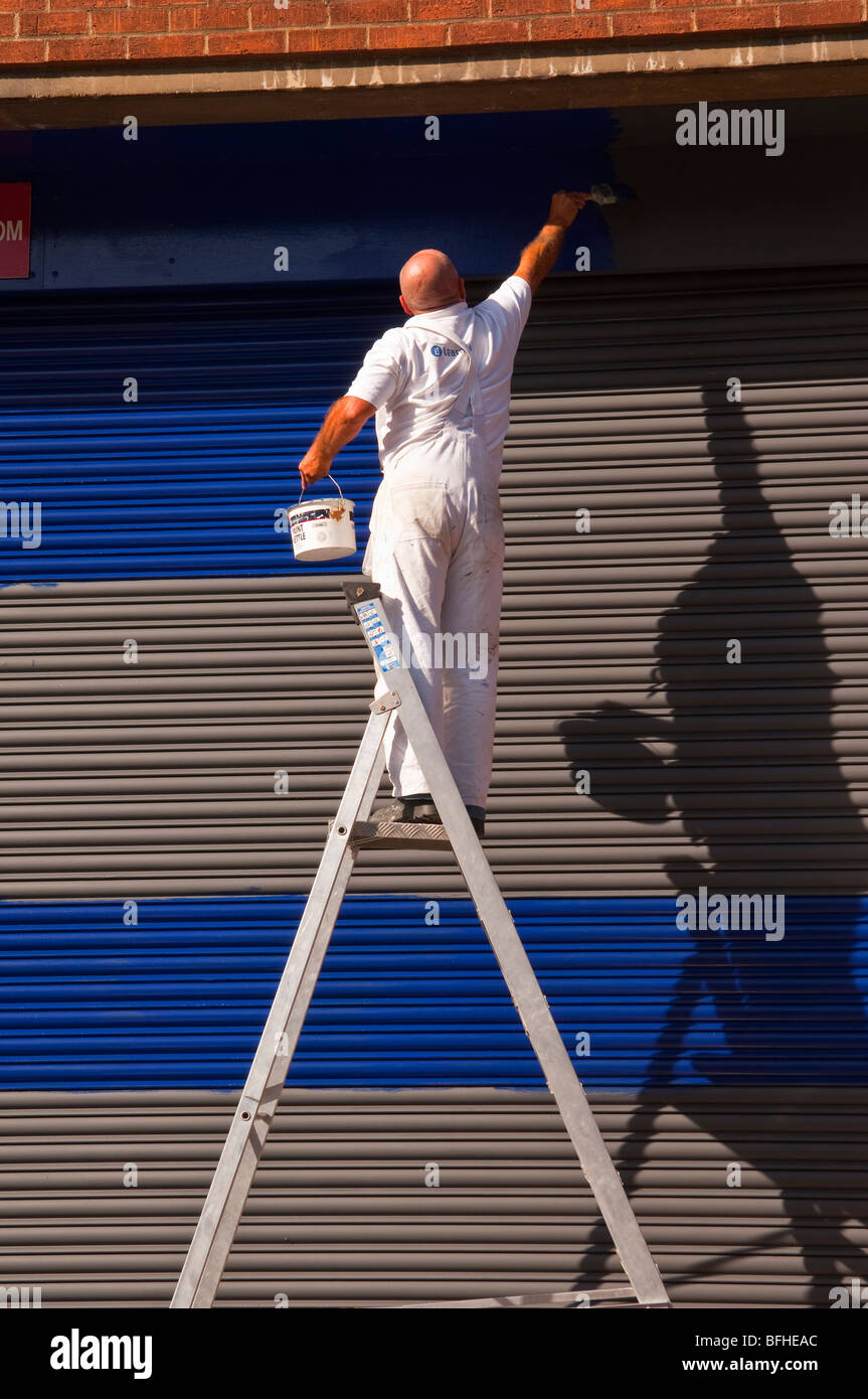 A Painter and decorator at work in Norwich,Norfolk,Uk Stock Photo - Alamy