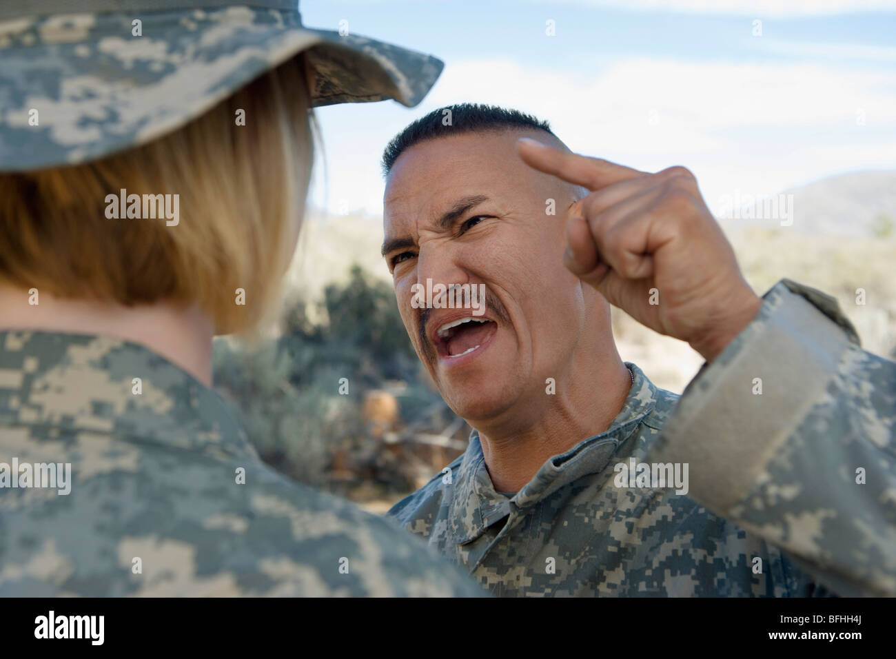 Commander yelling at female soldier Stock Photo Alamy