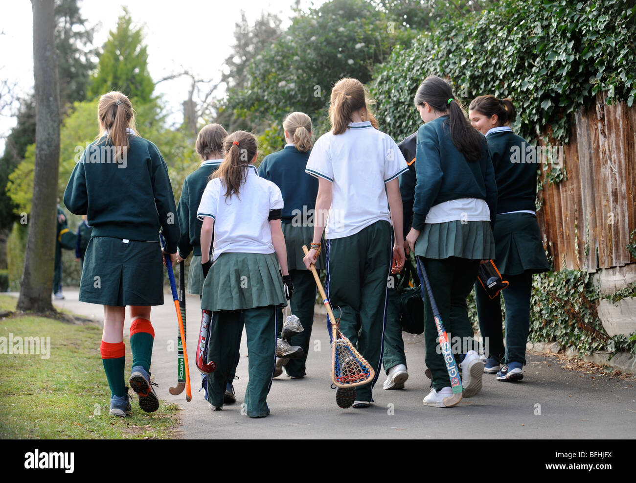 Girls from Cheltenham Ladies' College on their way to hockey and lacrosse practice Gloucestershire UK Stock Photo