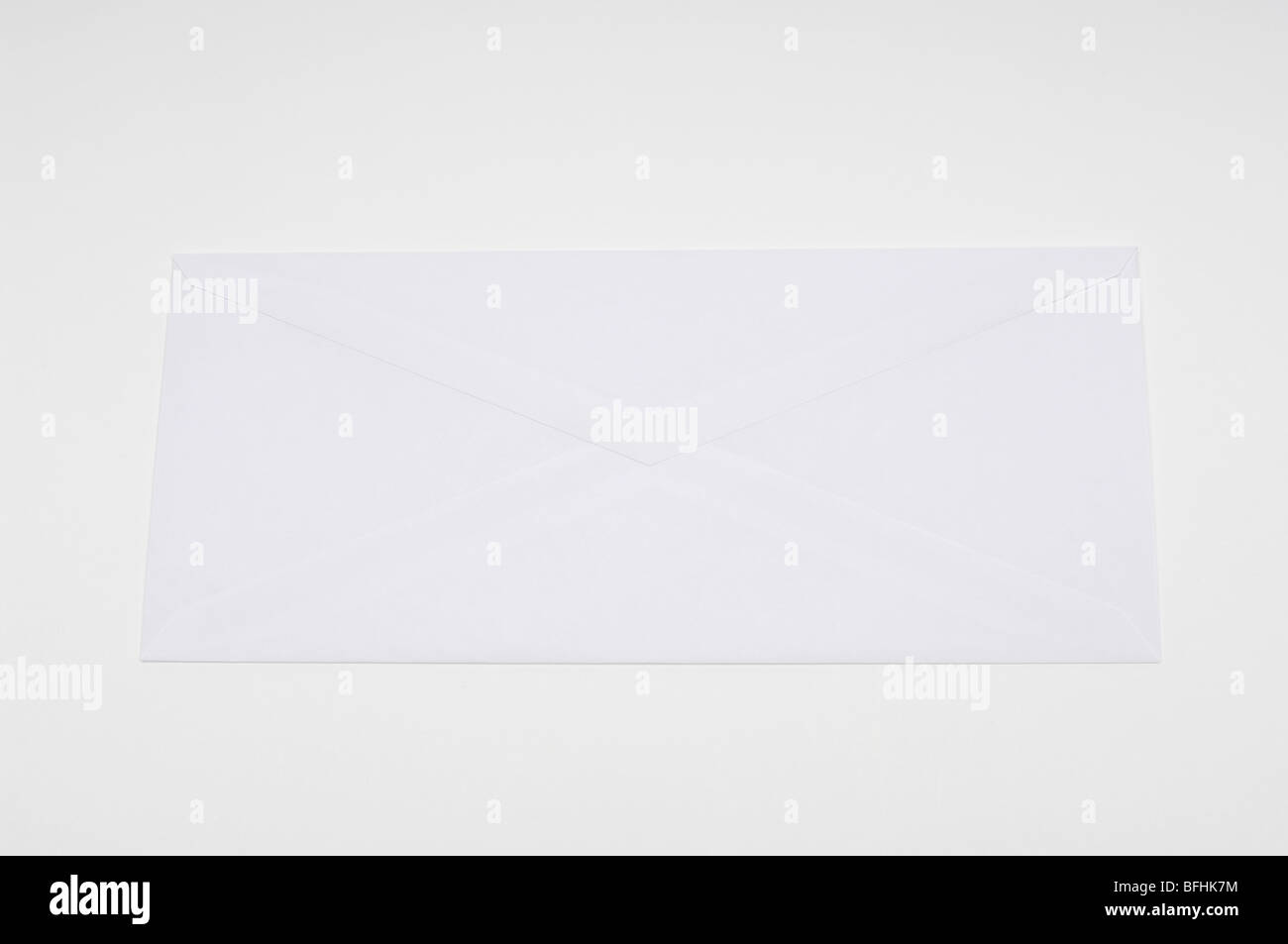 White envelope on white background Stock Photo - Alamy