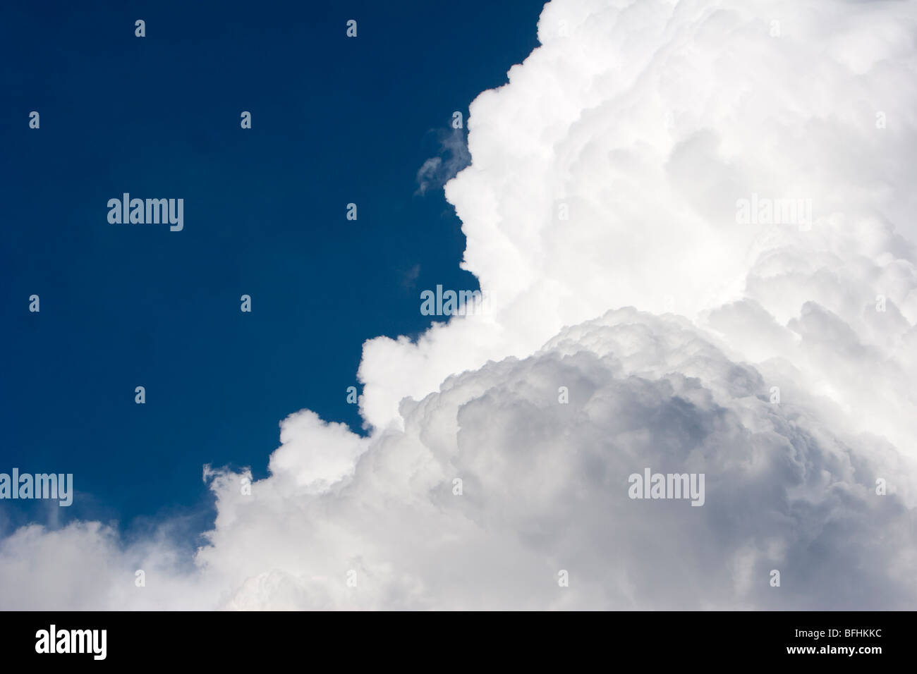 A cumulonimbus cloud poking into the sky. June 9, 2009. Stock Photo