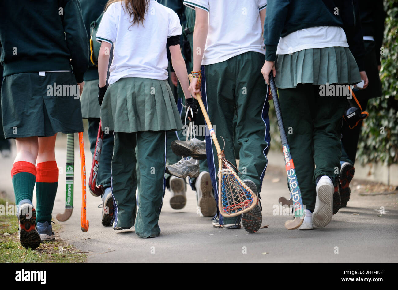 Girls from Cheltenham Ladies' College on their way to hockey and lacrosse practice Gloucestershire UK Stock Photo