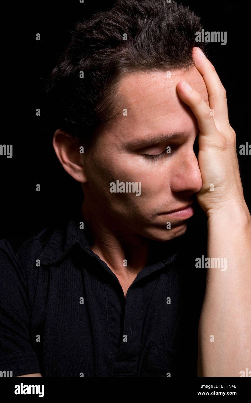 Expressive portrait of a young man Stock Photo - Alamy