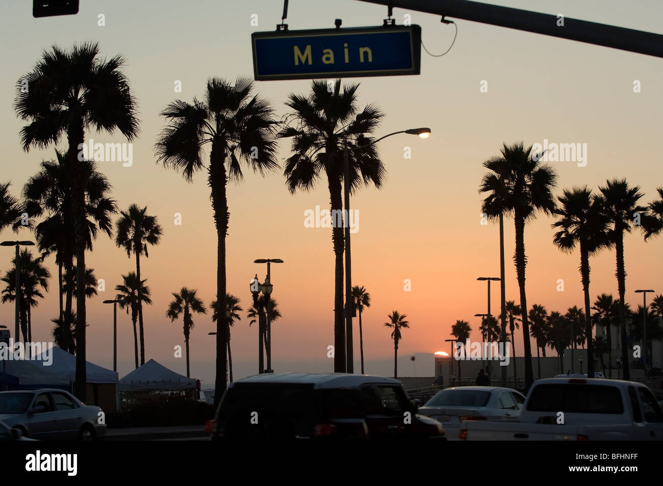 Main Street Huntington Beach At Sunset Showing Palm Trees In This Southern California Scene Main Street Huntington Beach At Sunset Showing Palm Trees In This Southern California Scene