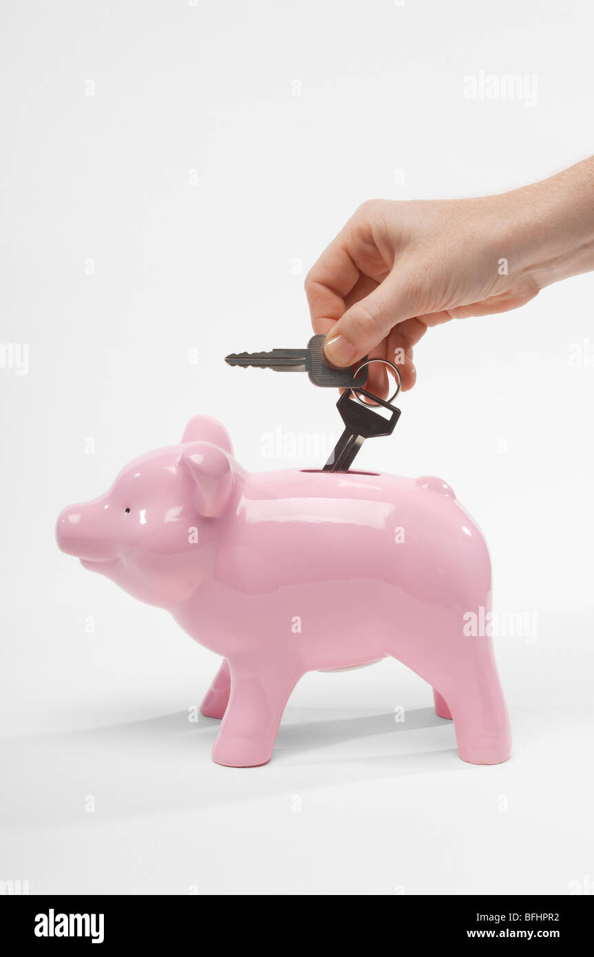 Key and piggy bank hires stock photography and images Alamy