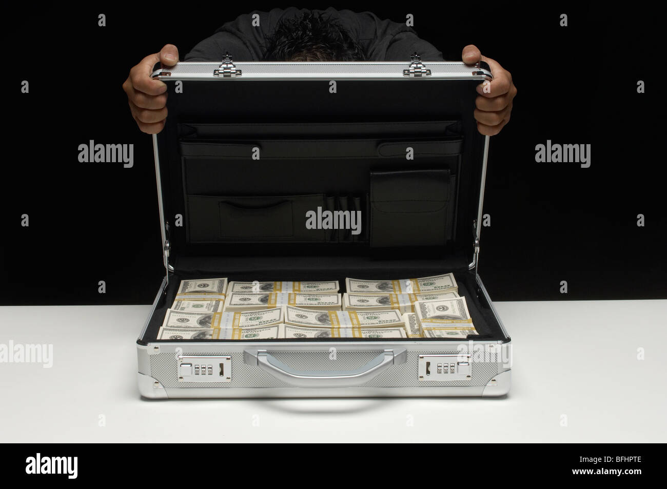 Woman briefcase full money hires stock photography and images Alamy