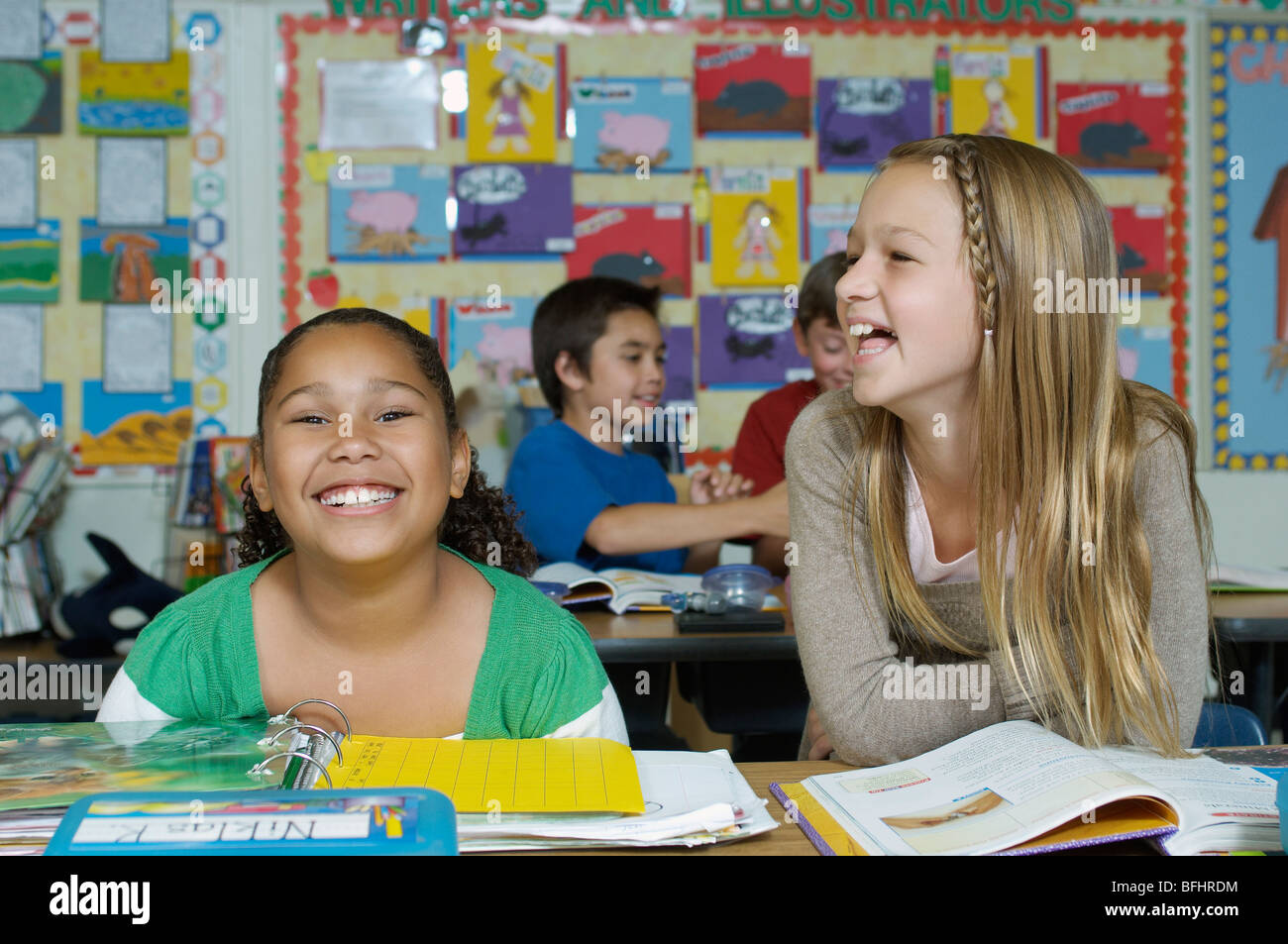 Laughing schoolgirls hi-res stock photography and images - Alamy