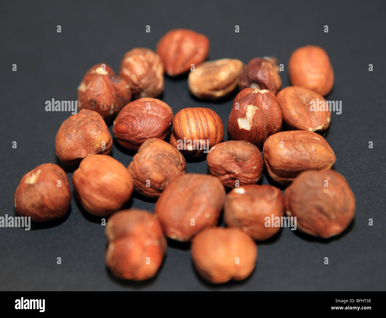 Hazelnuts on a black background Stock Photo
