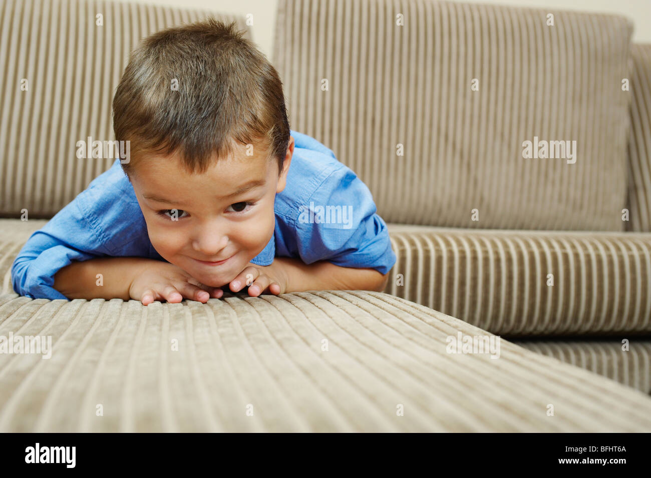 Teen boy relaxing sofa hi-res stock photography and images - Alamy
