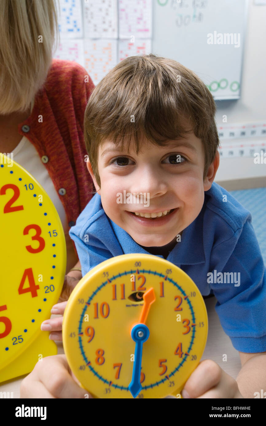 Little Boy Learning to Tell Time Stock Photo Alamy
