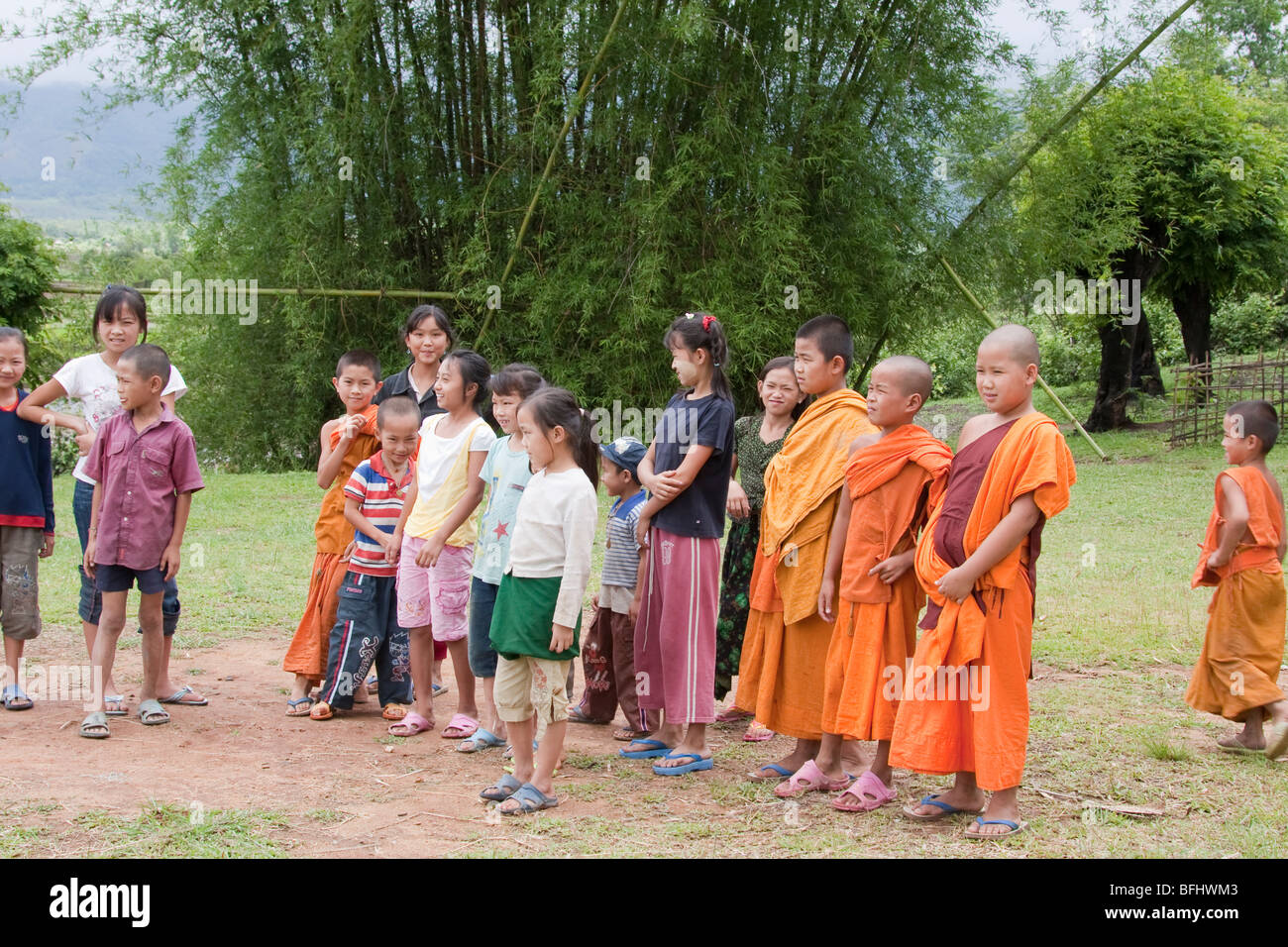 students from a rural Myanmar school pose for a class phto Stock Photo