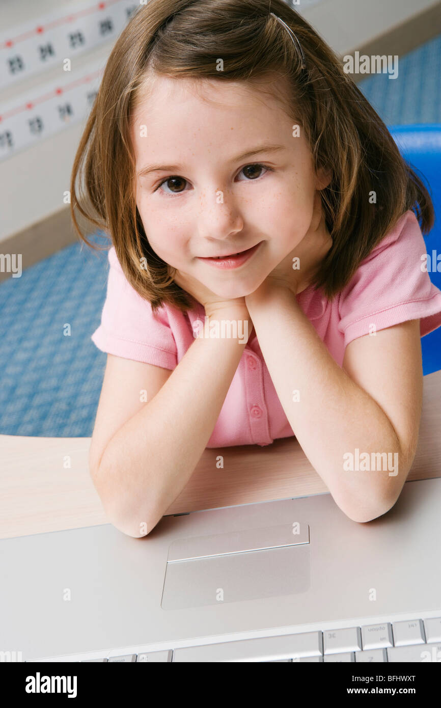 Little Girl Using a Laptop Stock Photo - Alamy