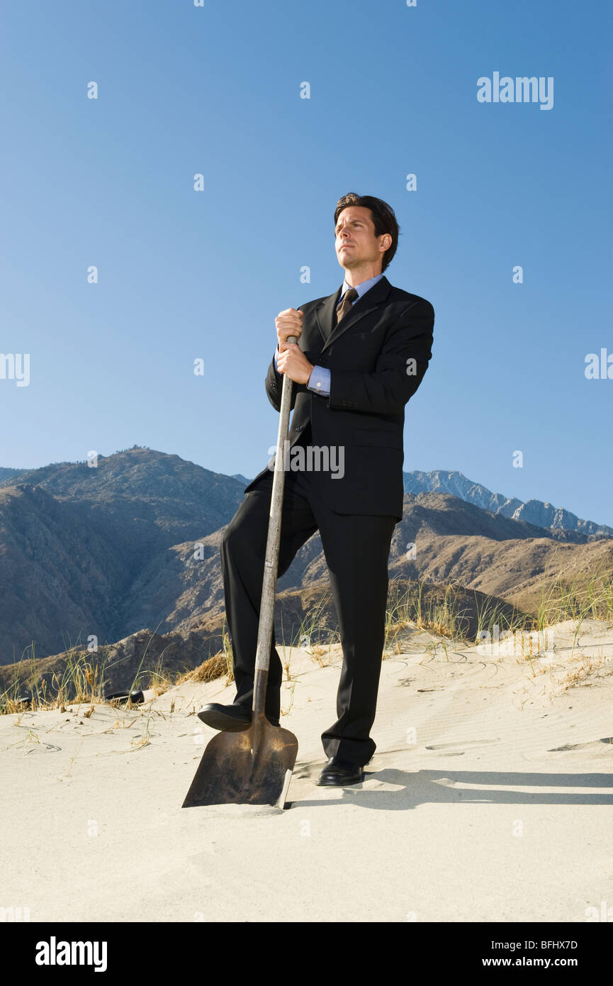 Man holding spade hi-res stock photography and images - Alamy