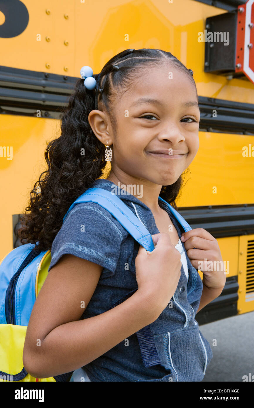 School Girl by School Bus Stock Photo Alamy