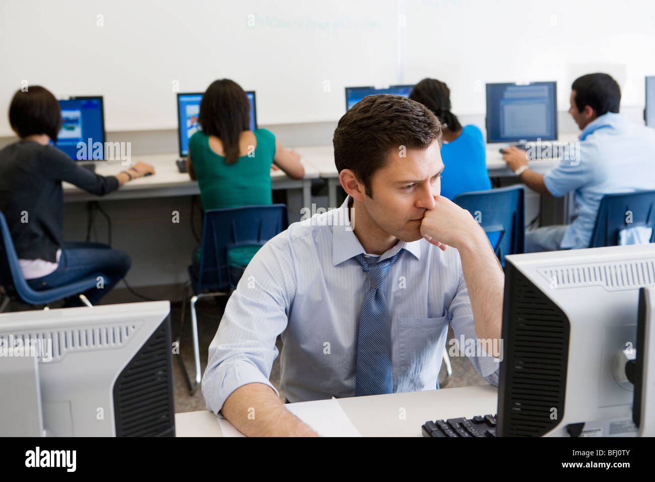 High School Teacher in Computer Lab Stock Photo - Alamy