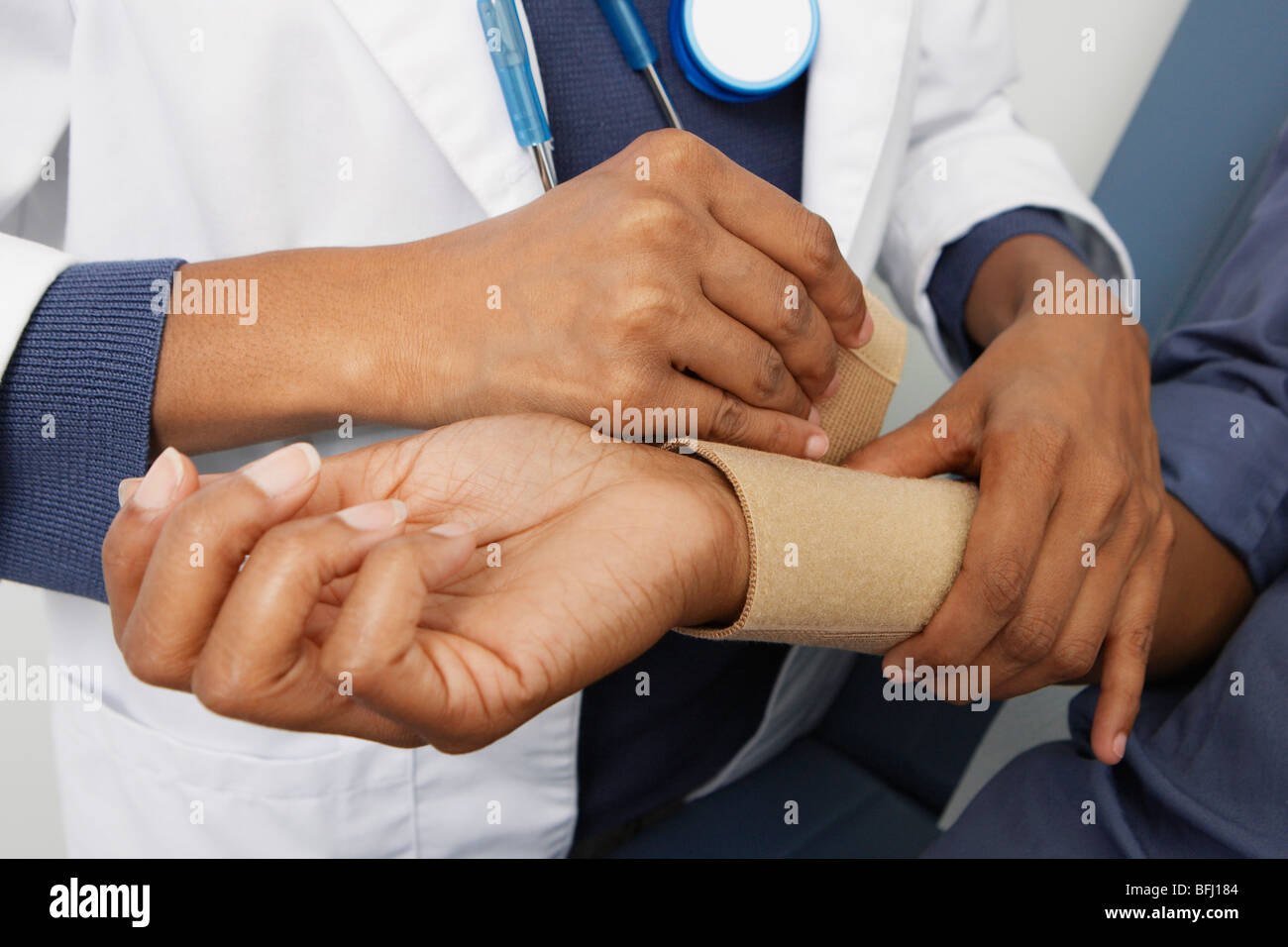 Checking pateint's blood pressure Stock Photo Alamy