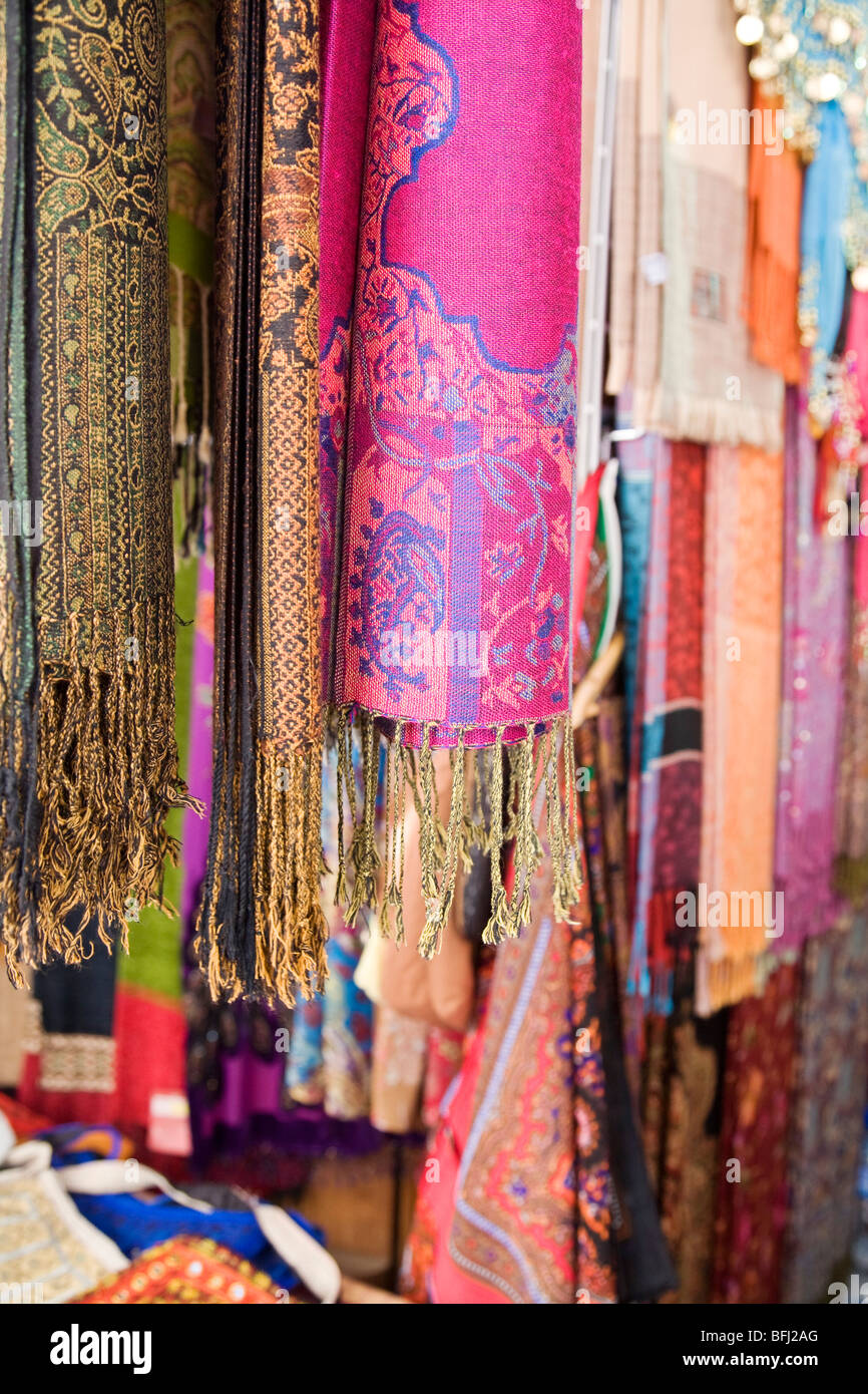 Colourful pashminas and fabrics for sale at bur dubai souq hires stock