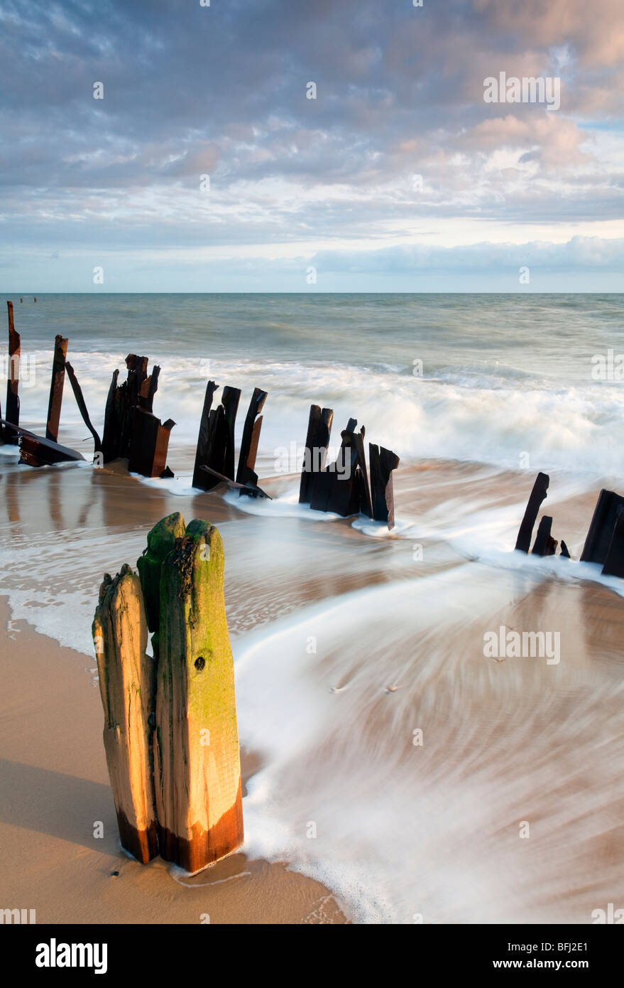 Derelict sea defences at first light at Happisburgh on the Norfolk