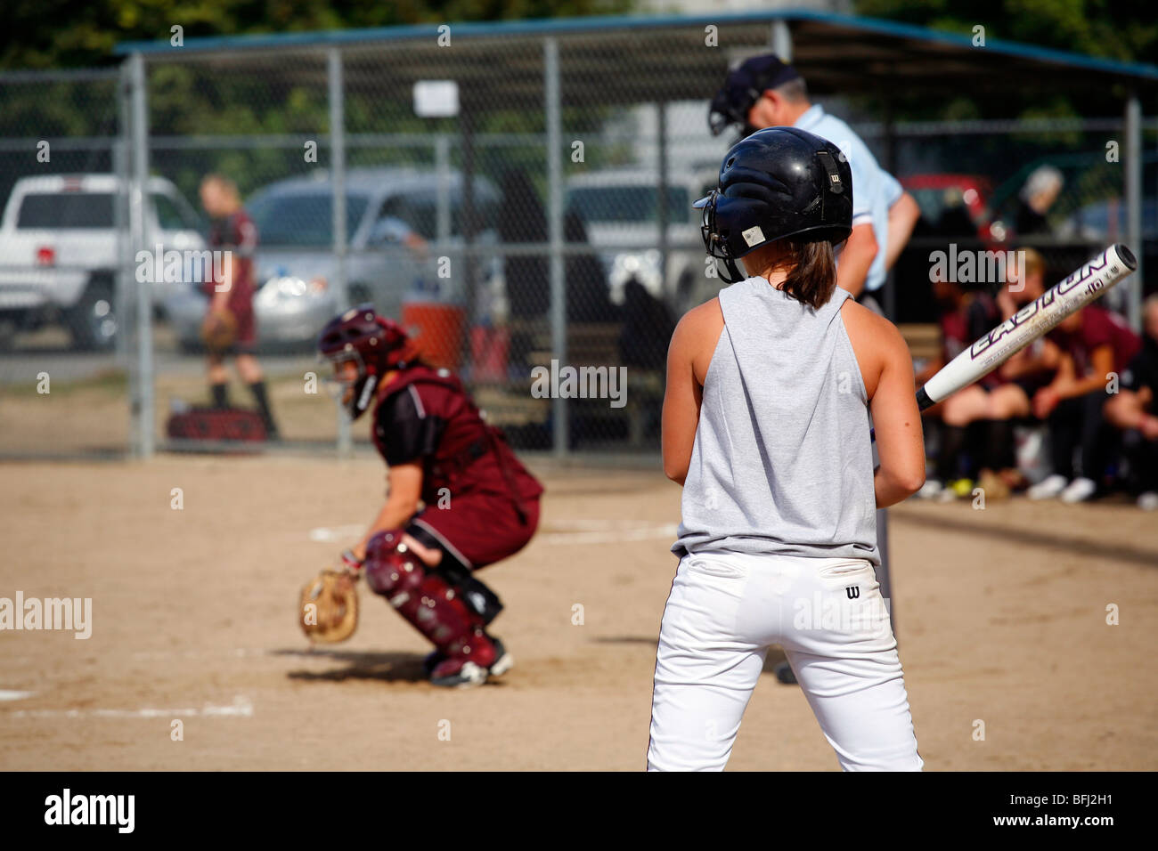 North Idaho College softball game, Sept. 28, 2008, Coeur D Alene, Idaho. Batter waiting on deck, getting ready to hit. Stock Photo