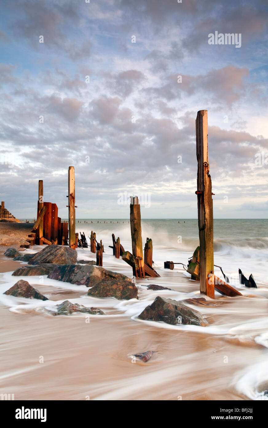 Derelict sea defences at first light at Happisburgh on the Norfolk