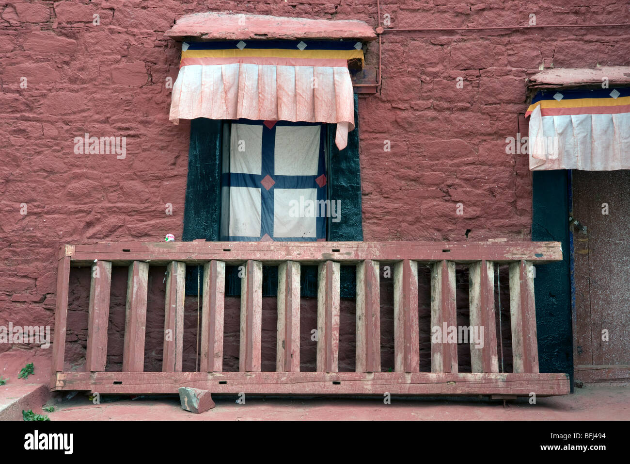 wall ladder and window traditional tibetan at ganden monastery Stock