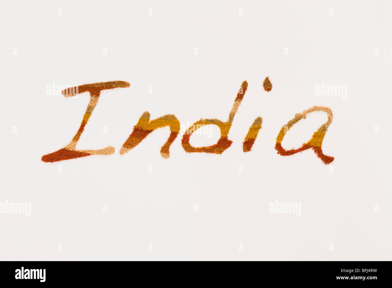 The word 'india' written in Indian spices on white background Stock Photo