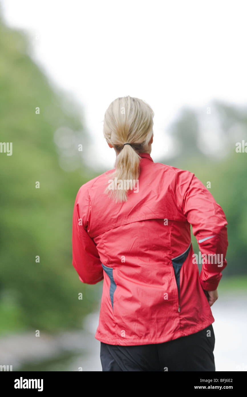 Woman 40s rear view park hi-res stock photography and images - Alamy