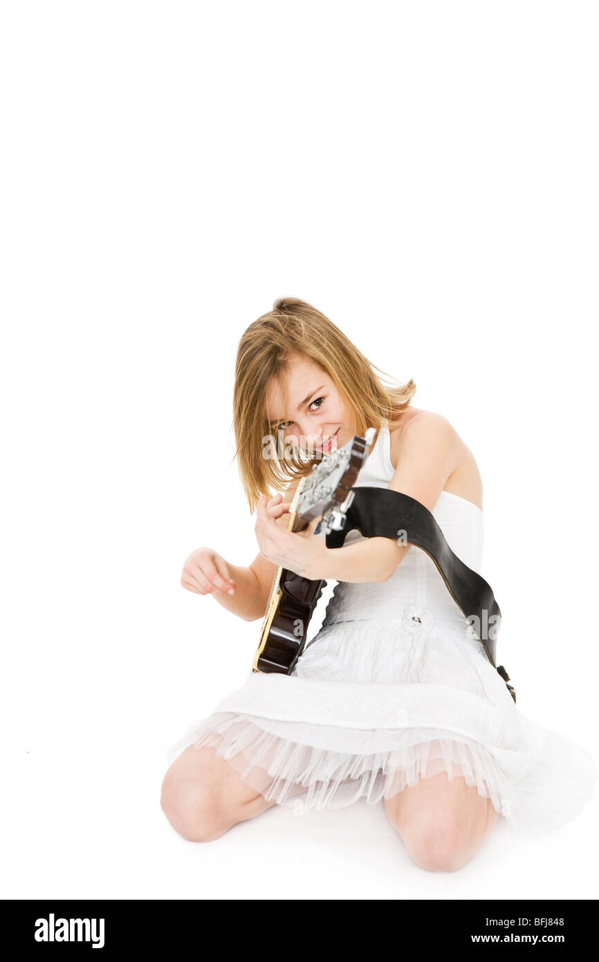 A girl playing music. Stock Photo