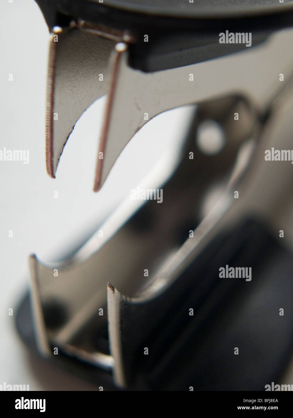 Close up of a metal staple remover Stock Photo - Alamy