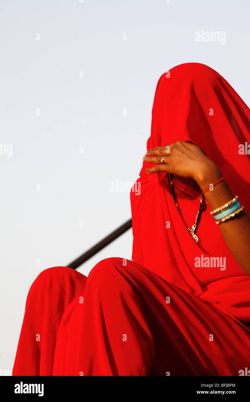lady in red sari Stock Photo - Alamy