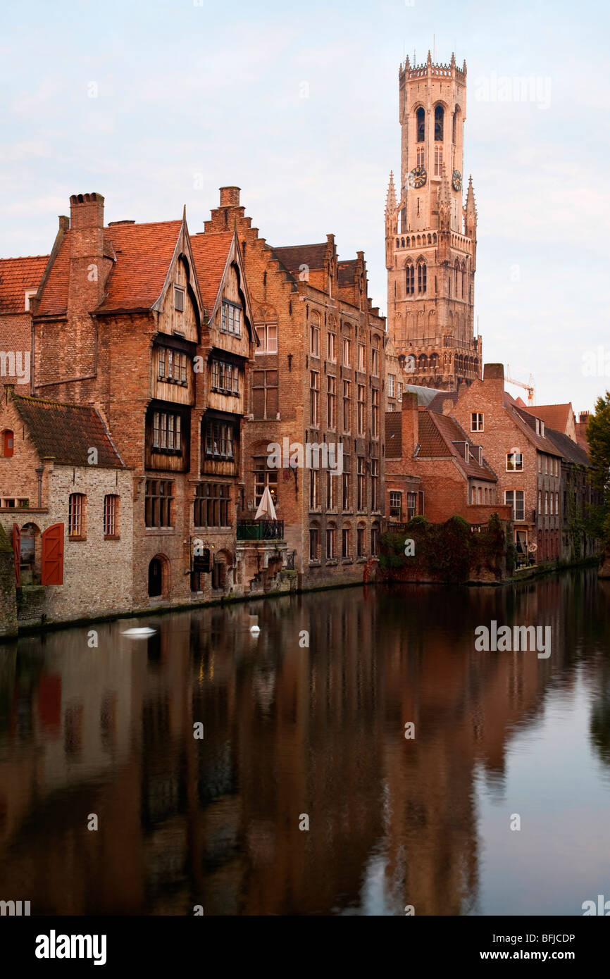 Evening view of the Belfort and canal reflections, Bruges, Belgium Stock Photo