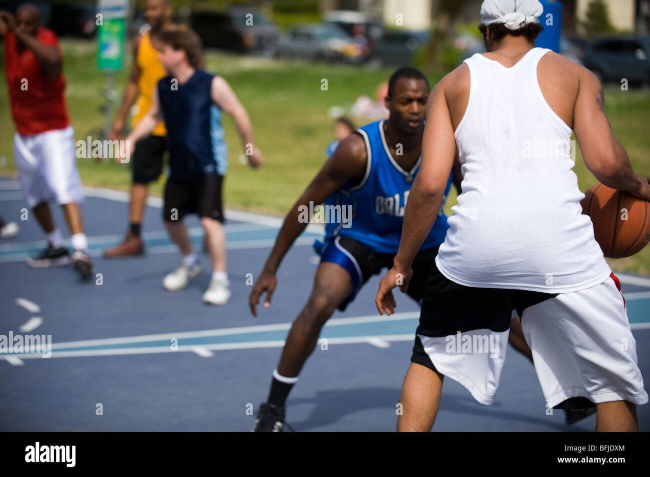 basketball players in an outdoor park in vancouver Stock Photo