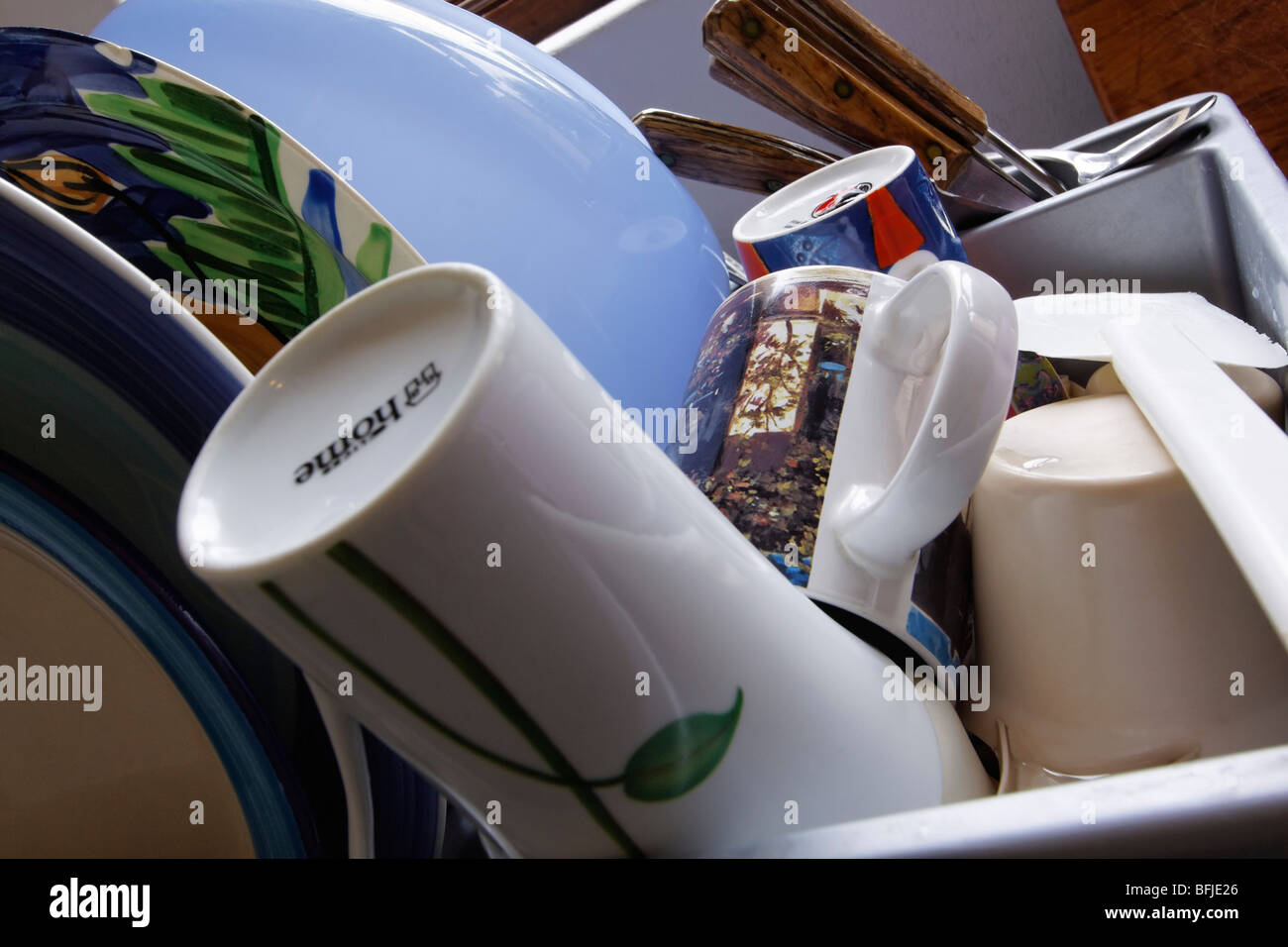 Dishes in drying rack after washing Stock Photo Alamy