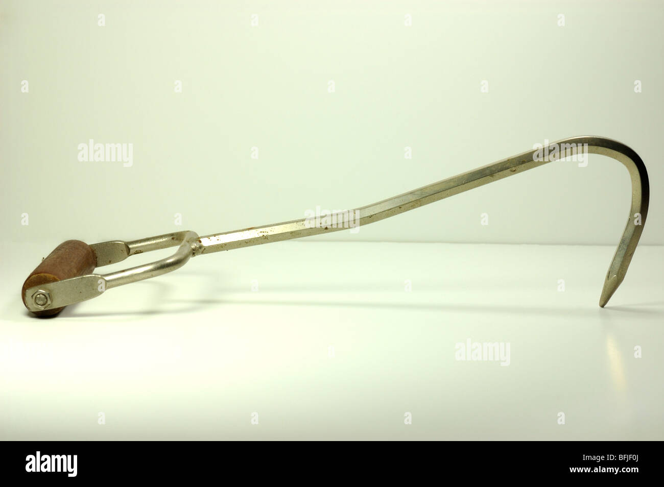 Metal hay hook farming tool used to extract hay from a rick or to hook and  carry a bale of hay Stock Photo - Alamy