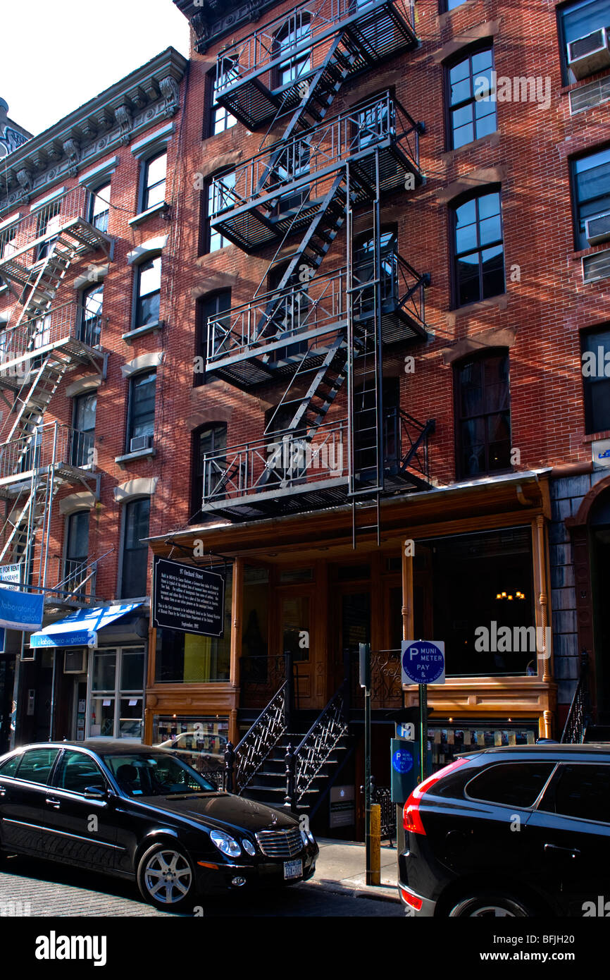 New York City The Big Apple Tenement Museum typical old building in Orchard Street restored to original decor & furnishing metal fire escape escapes Stock Photo