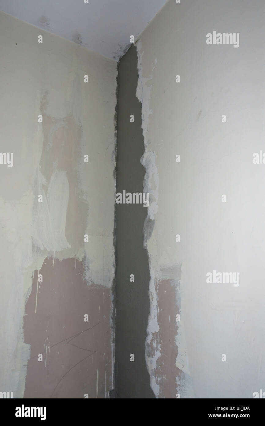 A Hole In A Wall Repaired With Bricks And Mortar After The