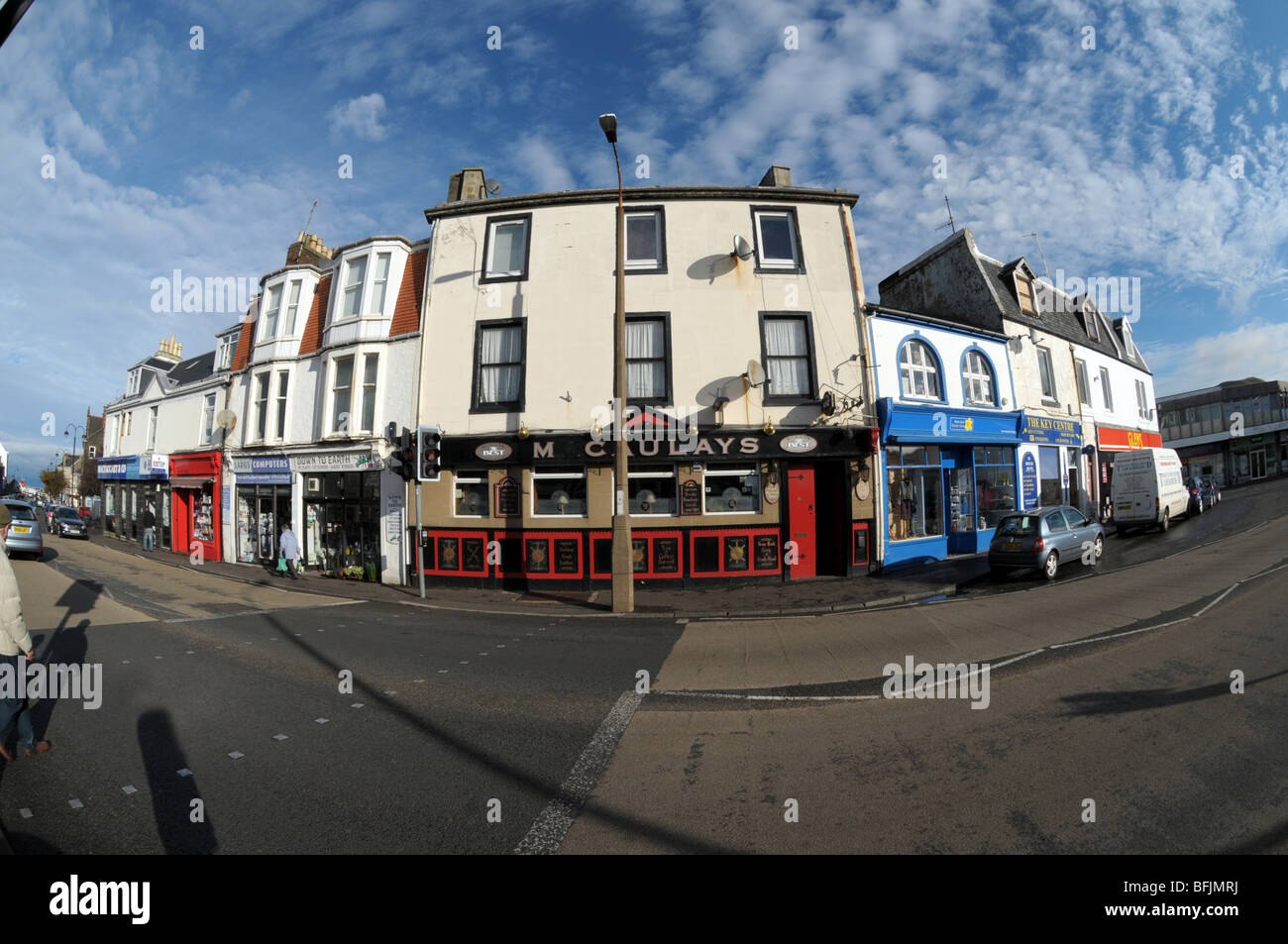 A pub and shops in the seaside town of Largs in Scotland. Stock Photo