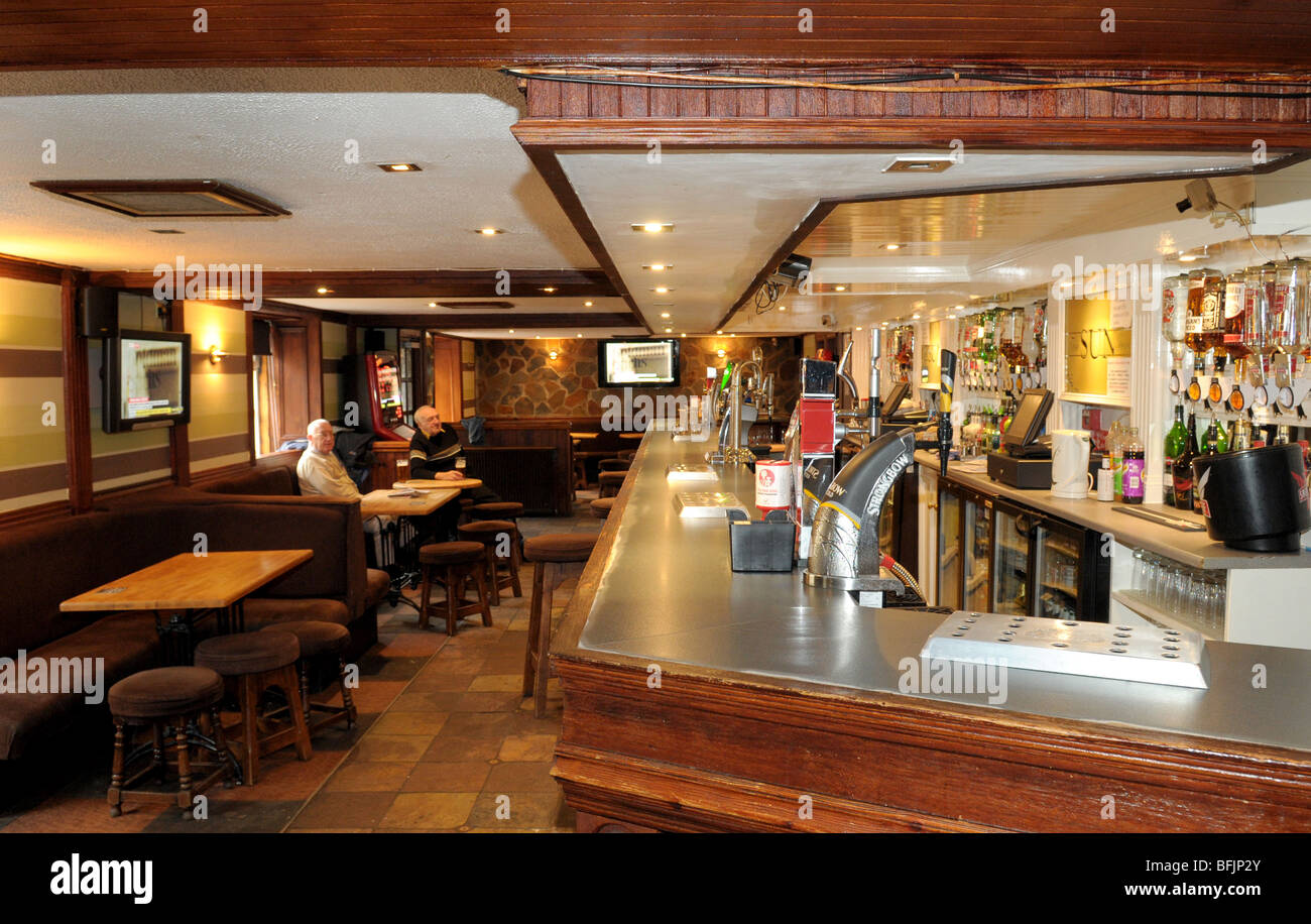 An interior shot of a bar inside a pub in Scotland. Stock Photo