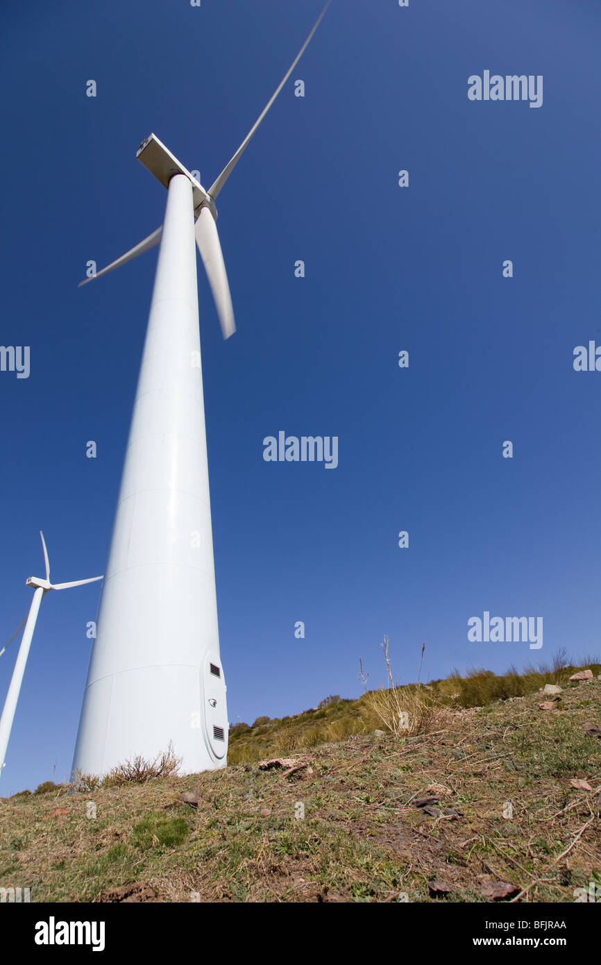 wind turbines renewable power over a blue sky Stock Photo