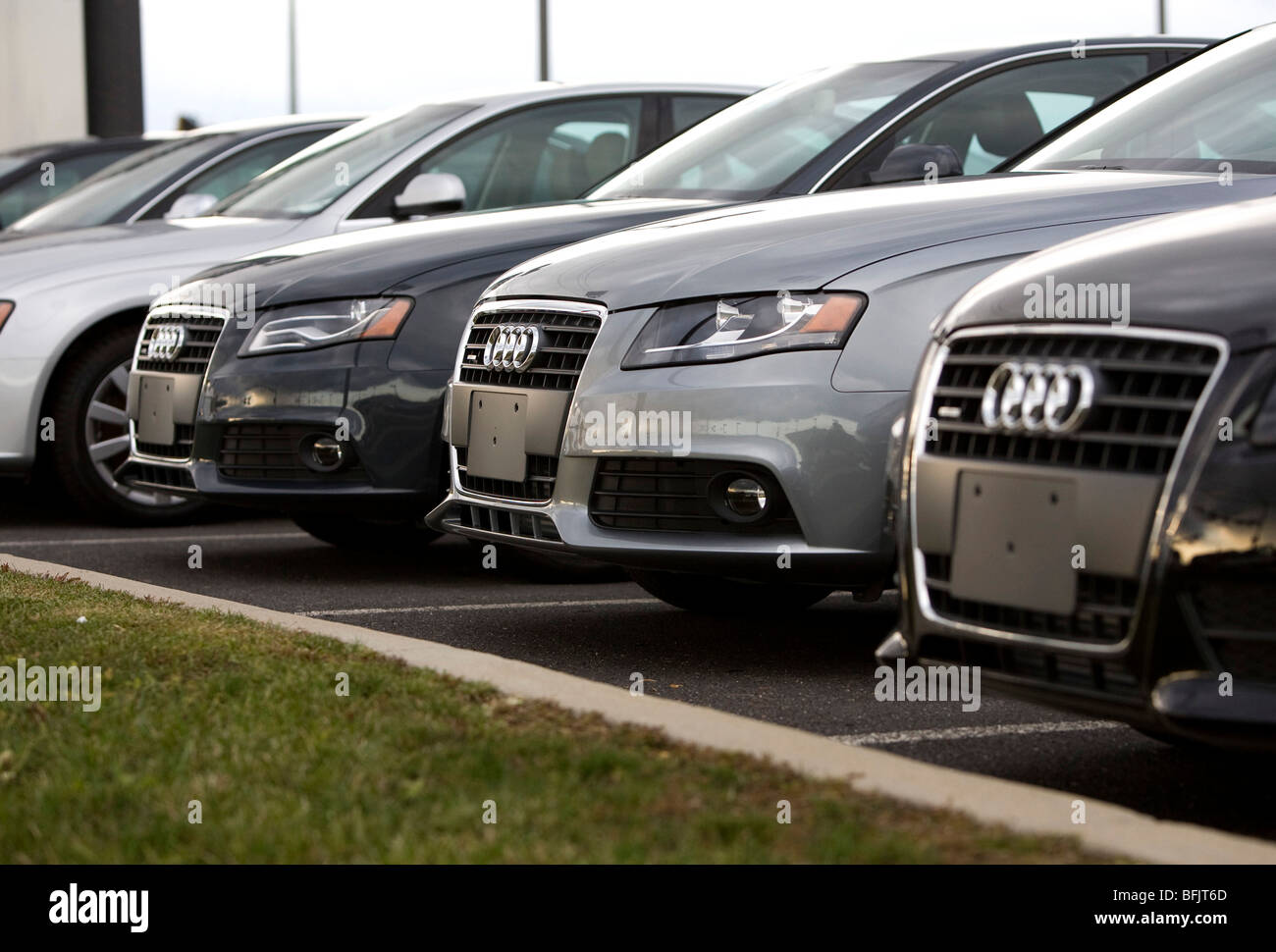 A Audi dealer lot in suburban Maryland.  Stock Photo