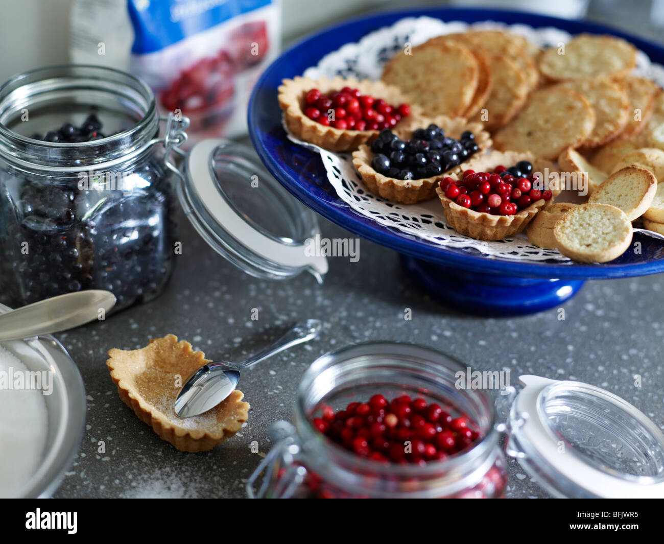 Lingonberry, cookies and bilberry on a worktop, Sweden Stock Photo - Alamy