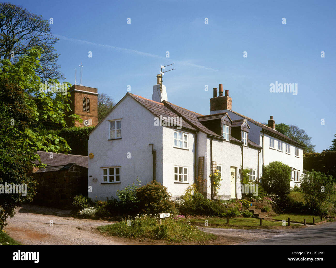 UK, England, Wirral, Burton village and St Nicholas church Stock Photo