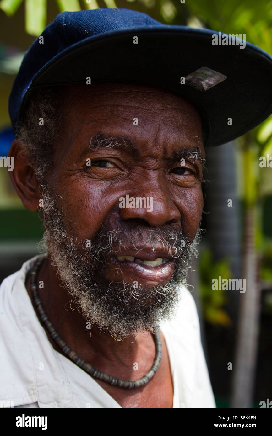 Bearded black man from Antigua wearing a blue baseball cap Stock Photo