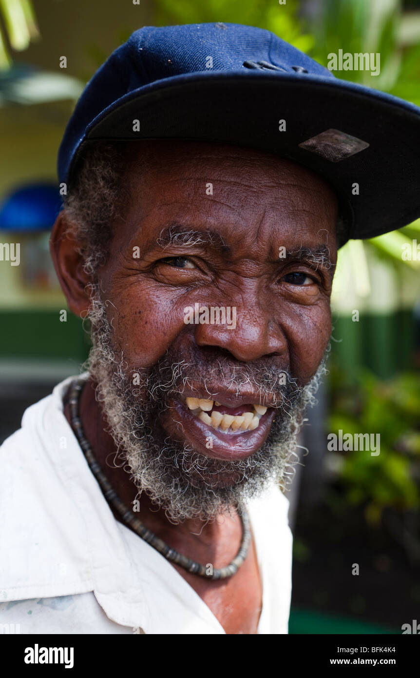 Bearded black man from Antigua wearing a blue baseball cap Stock Photo