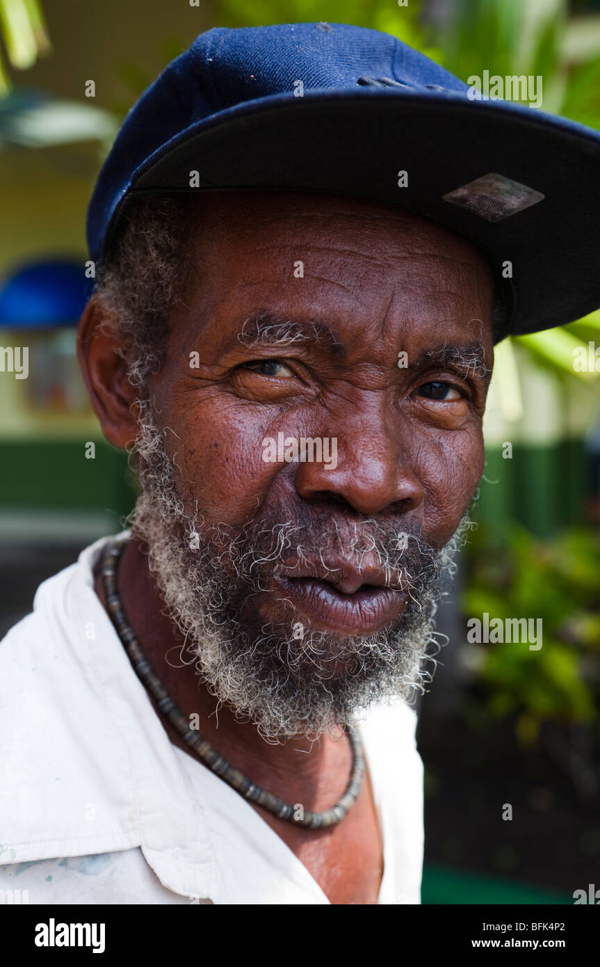 Bearded black man from Antigua wearing a blue baseball cap Stock Photo